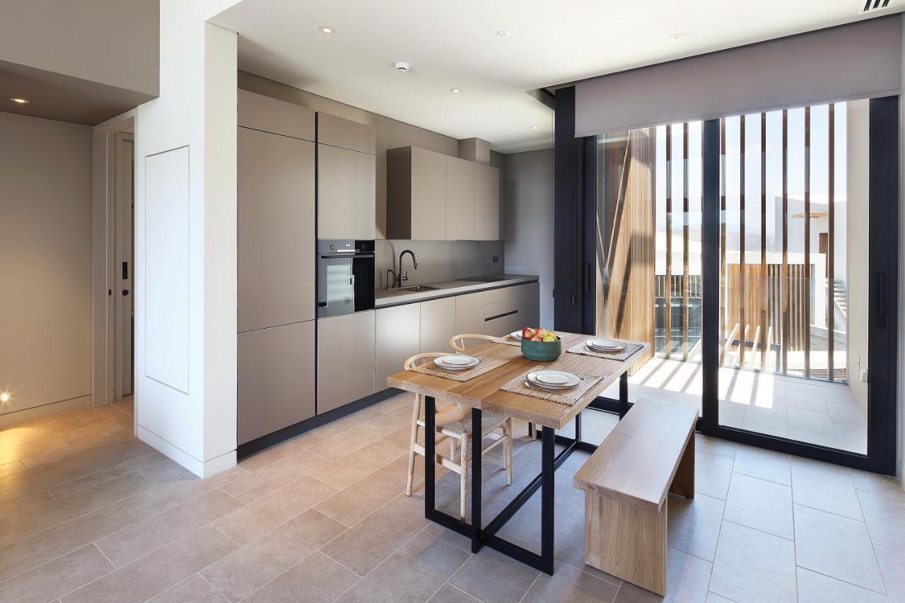 Minthis Resort Tsadha 外观 照片 The kitchen and dining area of a typical apartment
